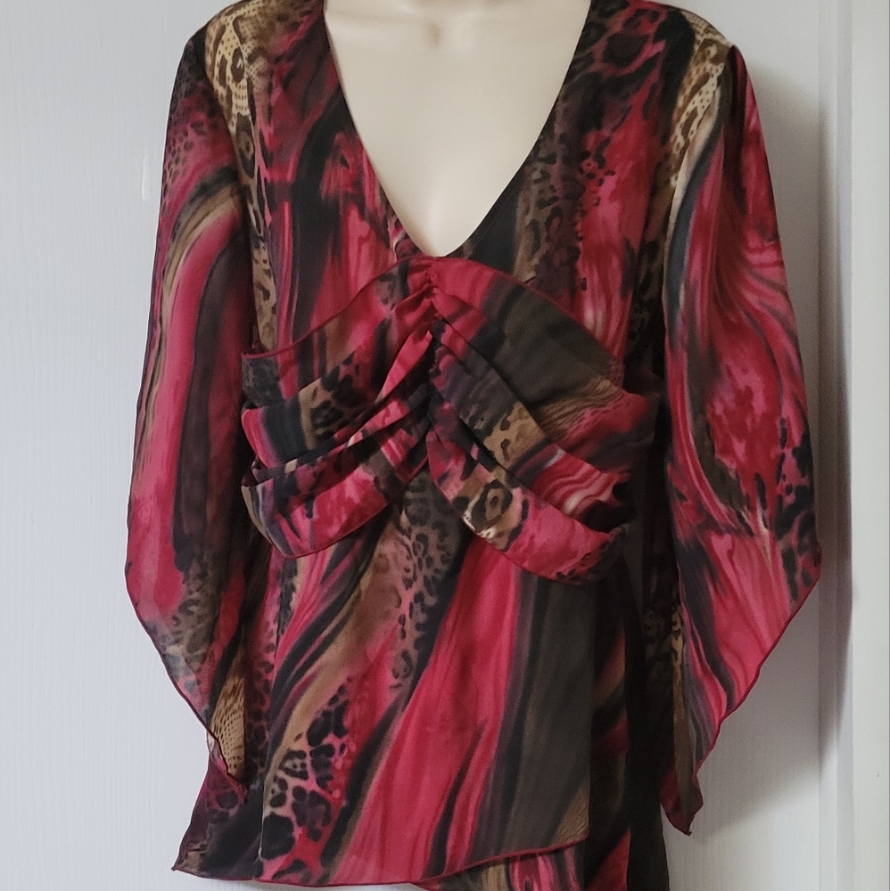 Women's Blouse by Piano $15